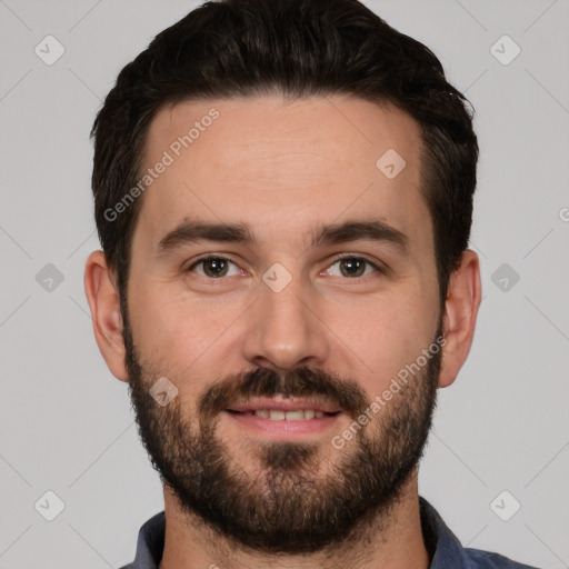 Joyful white young-adult male with short  black hair and brown eyes