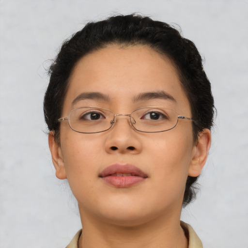 Neutral asian young-adult female with short  brown hair and brown eyes