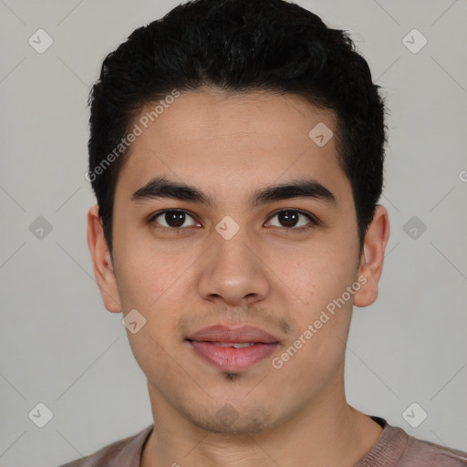 Joyful latino young-adult male with short  black hair and brown eyes