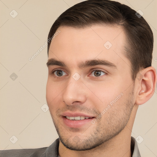 Joyful white young-adult male with short  brown hair and brown eyes