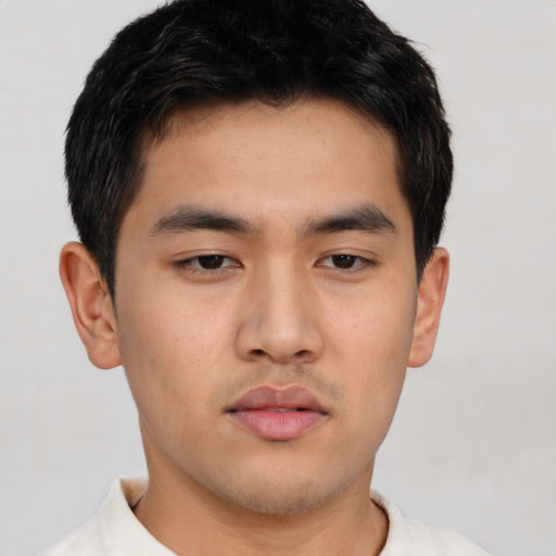 Neutral asian young-adult male with short  black hair and brown eyes