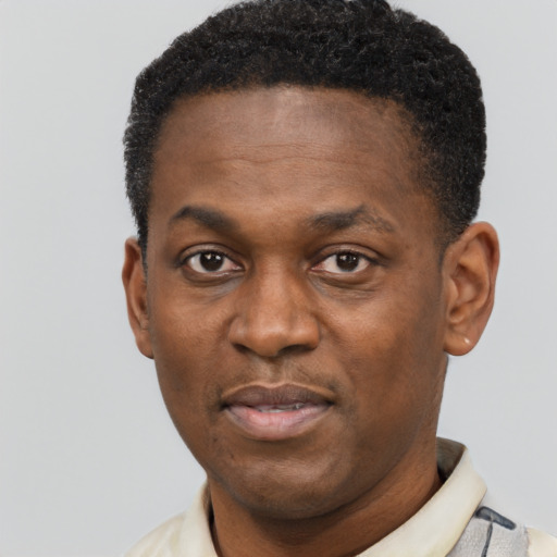 Neutral black young-adult male with short  black hair and brown eyes