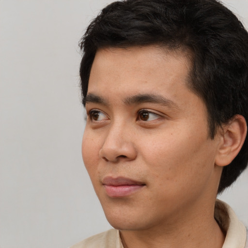 Neutral white young-adult male with short  black hair and brown eyes