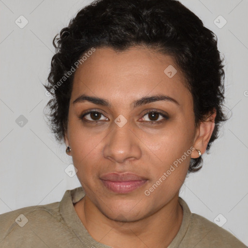 Joyful latino young-adult female with short  brown hair and brown eyes