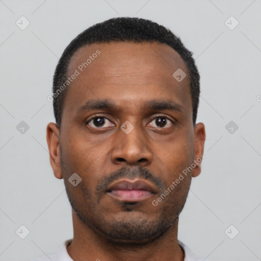 Neutral black young-adult male with short  black hair and brown eyes