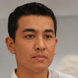 Neutral asian young-adult male with short  brown hair and brown eyes