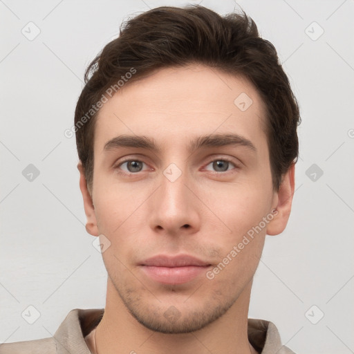 Neutral white young-adult male with short  brown hair and grey eyes