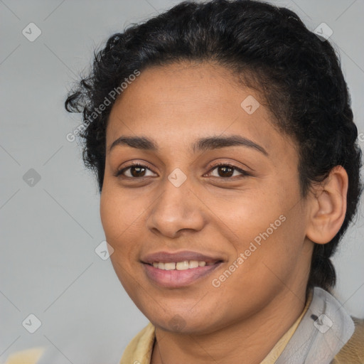 Joyful latino young-adult female with short  brown hair and brown eyes