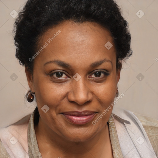 Joyful black adult female with short  brown hair and brown eyes