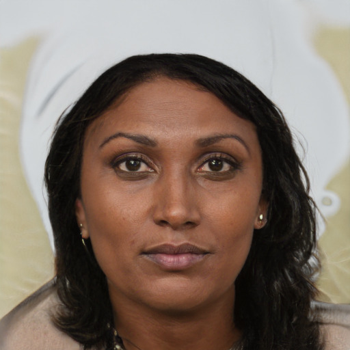 Neutral asian young-adult female with medium  brown hair and brown eyes
