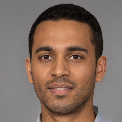 Neutral black young-adult male with short  black hair and brown eyes