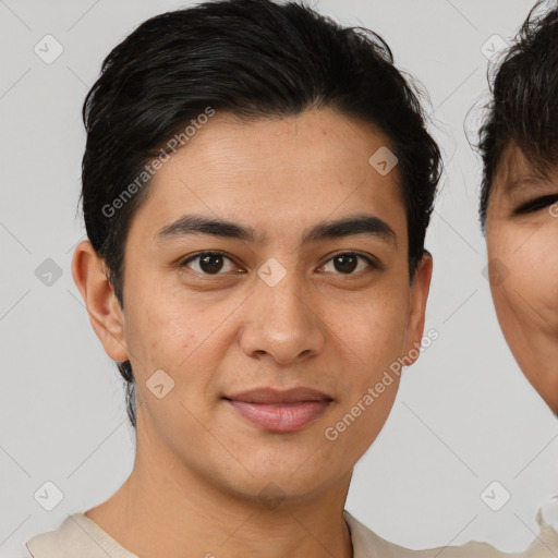 Joyful asian young-adult male with short  brown hair and brown eyes