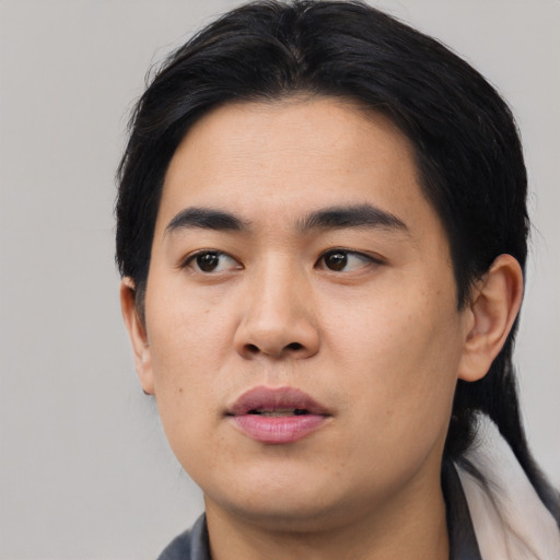 Neutral asian young-adult male with short  black hair and brown eyes