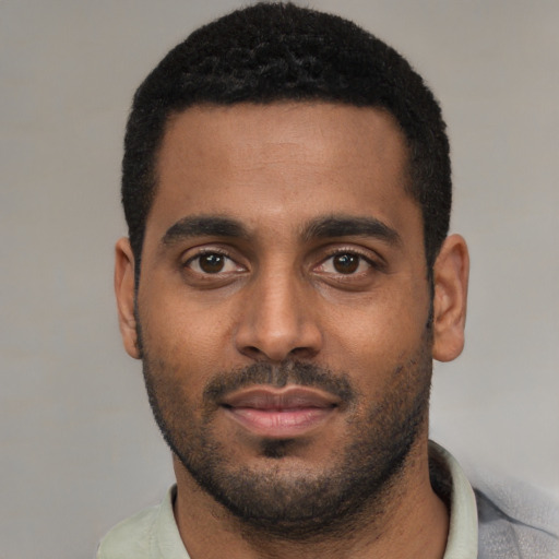 Neutral black young-adult male with short  black hair and brown eyes