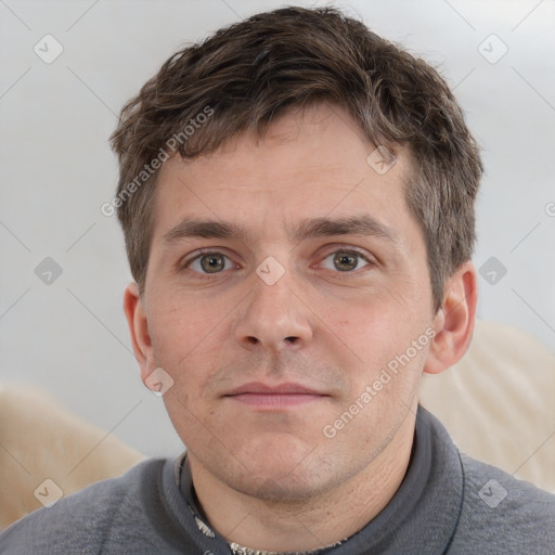 Neutral white young-adult male with short  brown hair and grey eyes