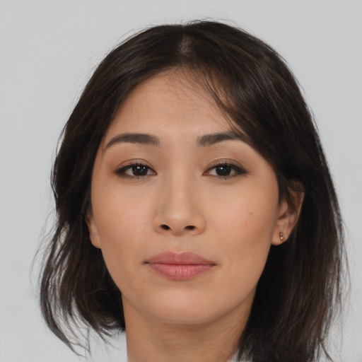 Neutral asian young-adult female with medium  brown hair and brown eyes