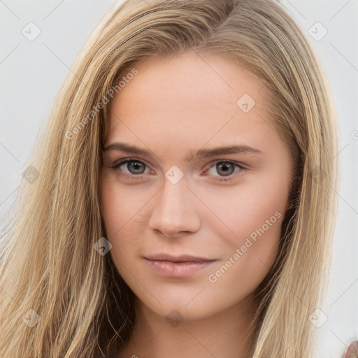 Neutral white young-adult female with long  brown hair and brown eyes