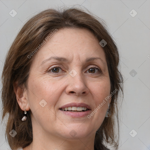 Joyful white adult female with medium  brown hair and grey eyes