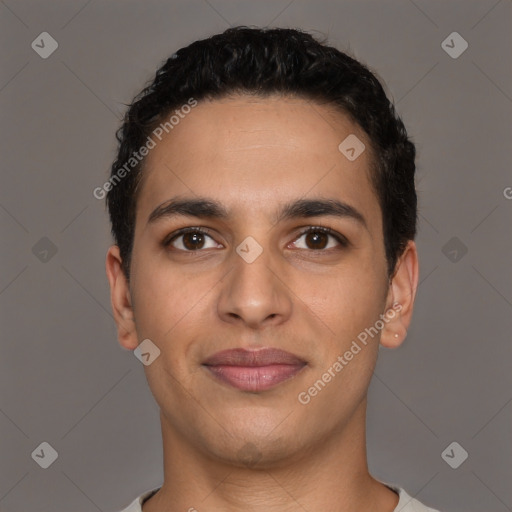 Joyful latino young-adult male with short  black hair and brown eyes