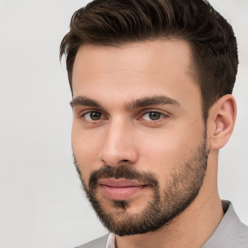 Neutral white young-adult male with short  brown hair and brown eyes