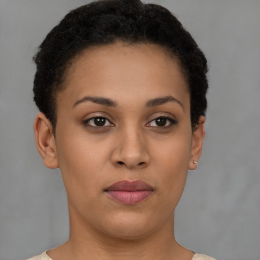 Joyful asian young-adult female with short  brown hair and brown eyes