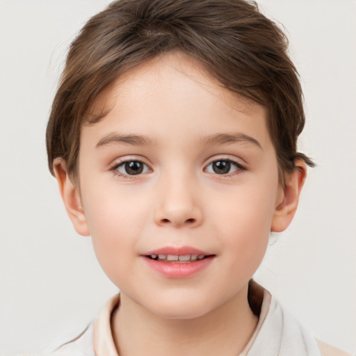 Joyful white child female with short  brown hair and brown eyes