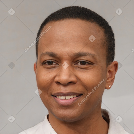 Joyful latino young-adult male with short  brown hair and brown eyes