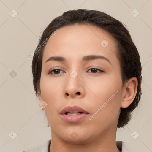 Neutral white young-adult female with medium  brown hair and brown eyes