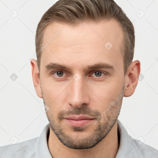 Neutral white young-adult male with short  brown hair and brown eyes