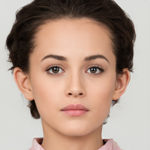 Neutral white young-adult female with medium  brown hair and brown eyes