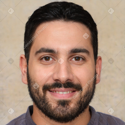 Joyful white young-adult male with short  black hair and brown eyes