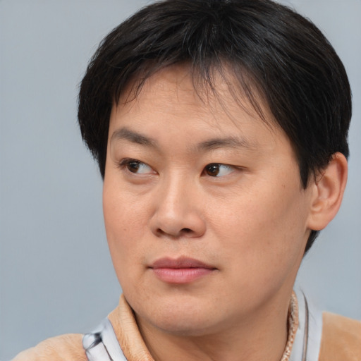 Neutral asian young-adult female with short  brown hair and brown eyes