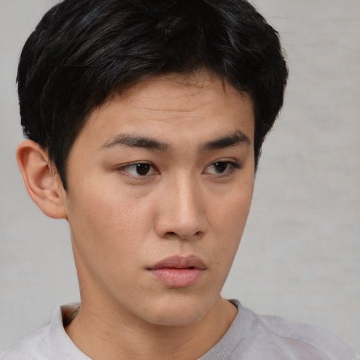 Neutral asian young-adult male with short  brown hair and brown eyes
