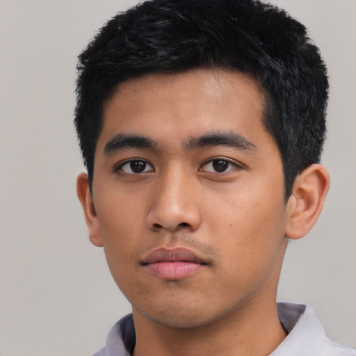 Neutral asian young-adult male with short  black hair and brown eyes