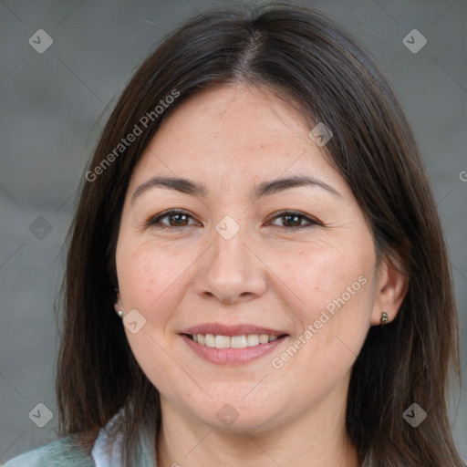 Joyful white adult female with medium  brown hair and brown eyes