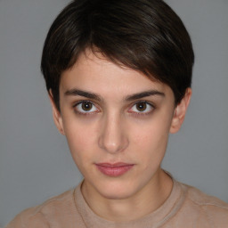 Neutral white young-adult female with short  brown hair and brown eyes