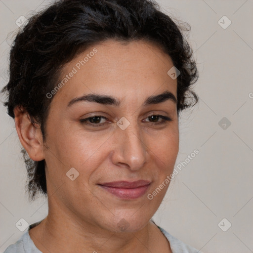 Joyful white adult female with short  brown hair and brown eyes