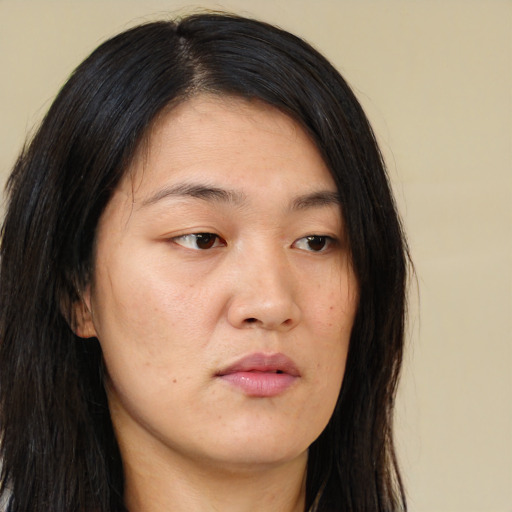 Neutral asian young-adult female with long  brown hair and brown eyes