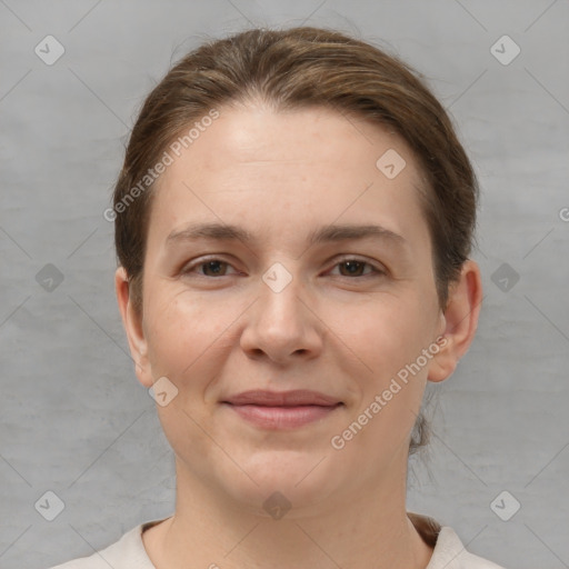 Joyful white young-adult female with short  brown hair and brown eyes