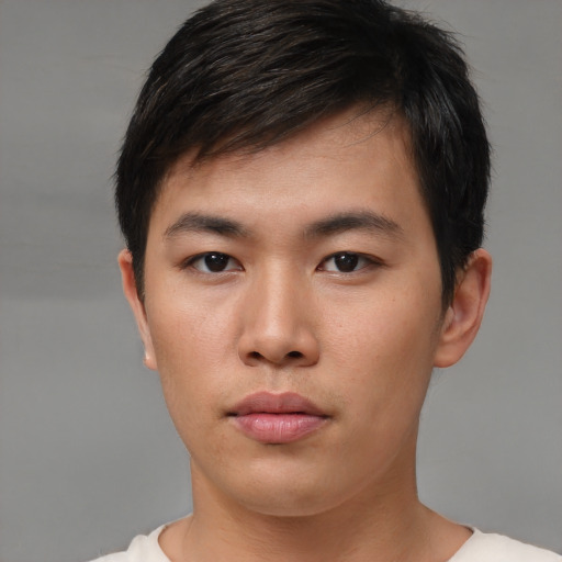 Neutral asian young-adult male with short  brown hair and brown eyes