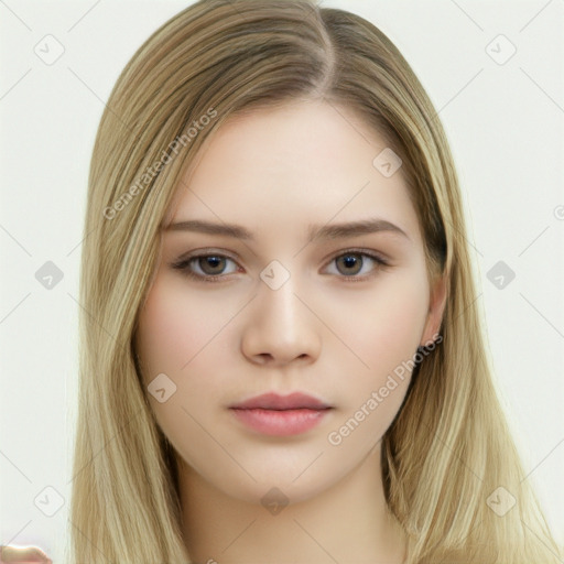 Neutral white young-adult female with long  brown hair and brown eyes