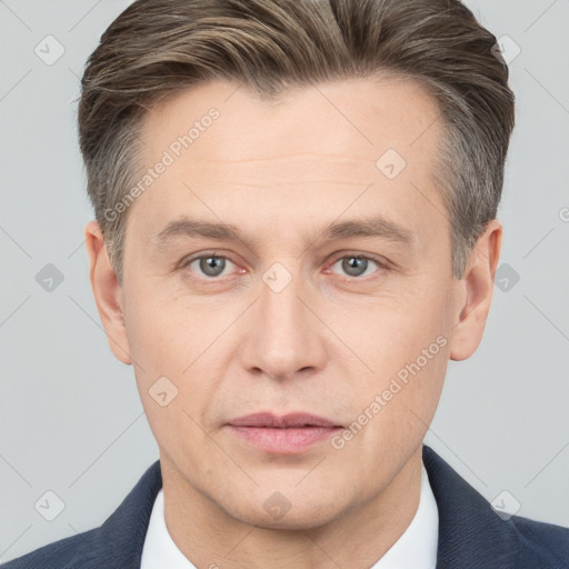 Neutral white adult male with short  brown hair and brown eyes