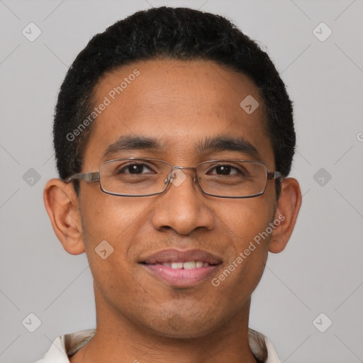 Joyful latino young-adult male with short  brown hair and brown eyes