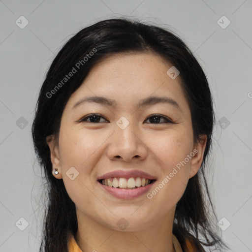 Joyful asian young-adult female with medium  black hair and brown eyes