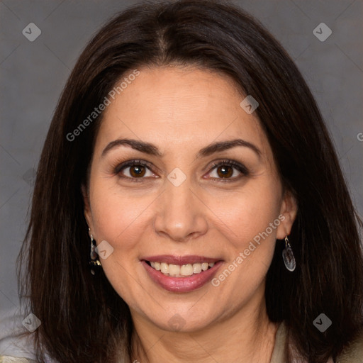 Joyful white adult female with long  brown hair and brown eyes