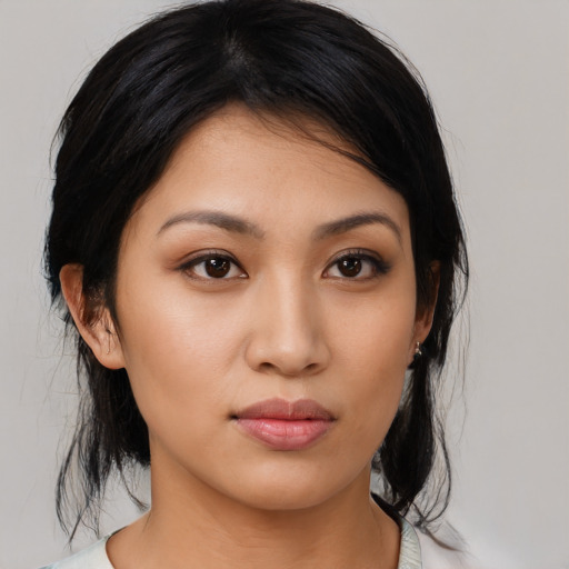 Neutral latino young-adult female with medium  black hair and brown eyes