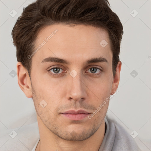 Neutral white young-adult male with short  brown hair and grey eyes