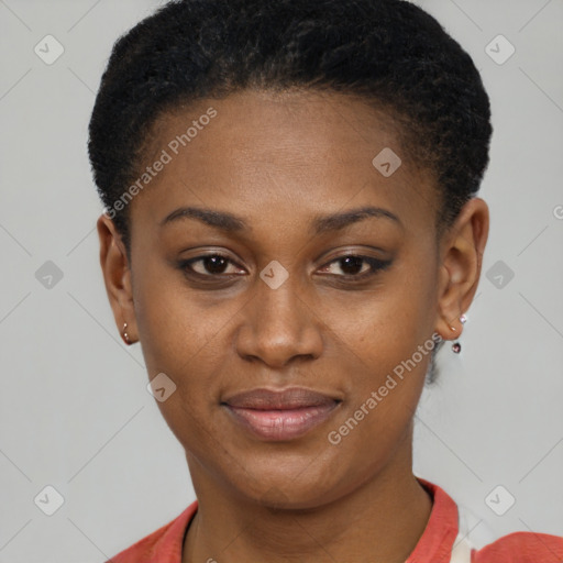 Joyful black young-adult female with short  brown hair and brown eyes