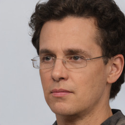 Neutral white adult male with short  brown hair and brown eyes