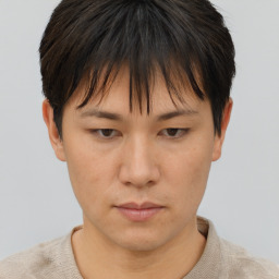 Neutral white young-adult female with short  brown hair and brown eyes
